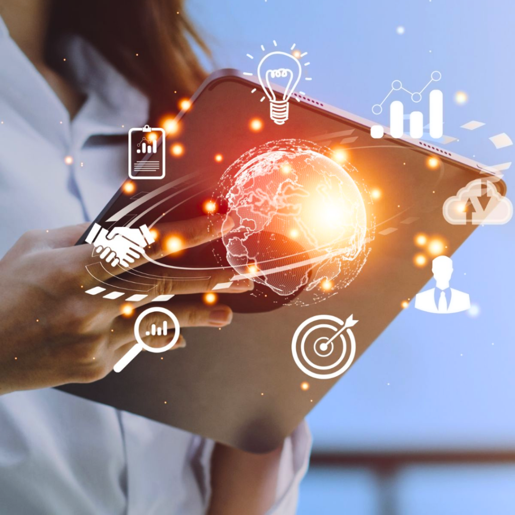 Businessperson using a tablet with a glowing globe and business icons, representing international structuring from Indonesia.