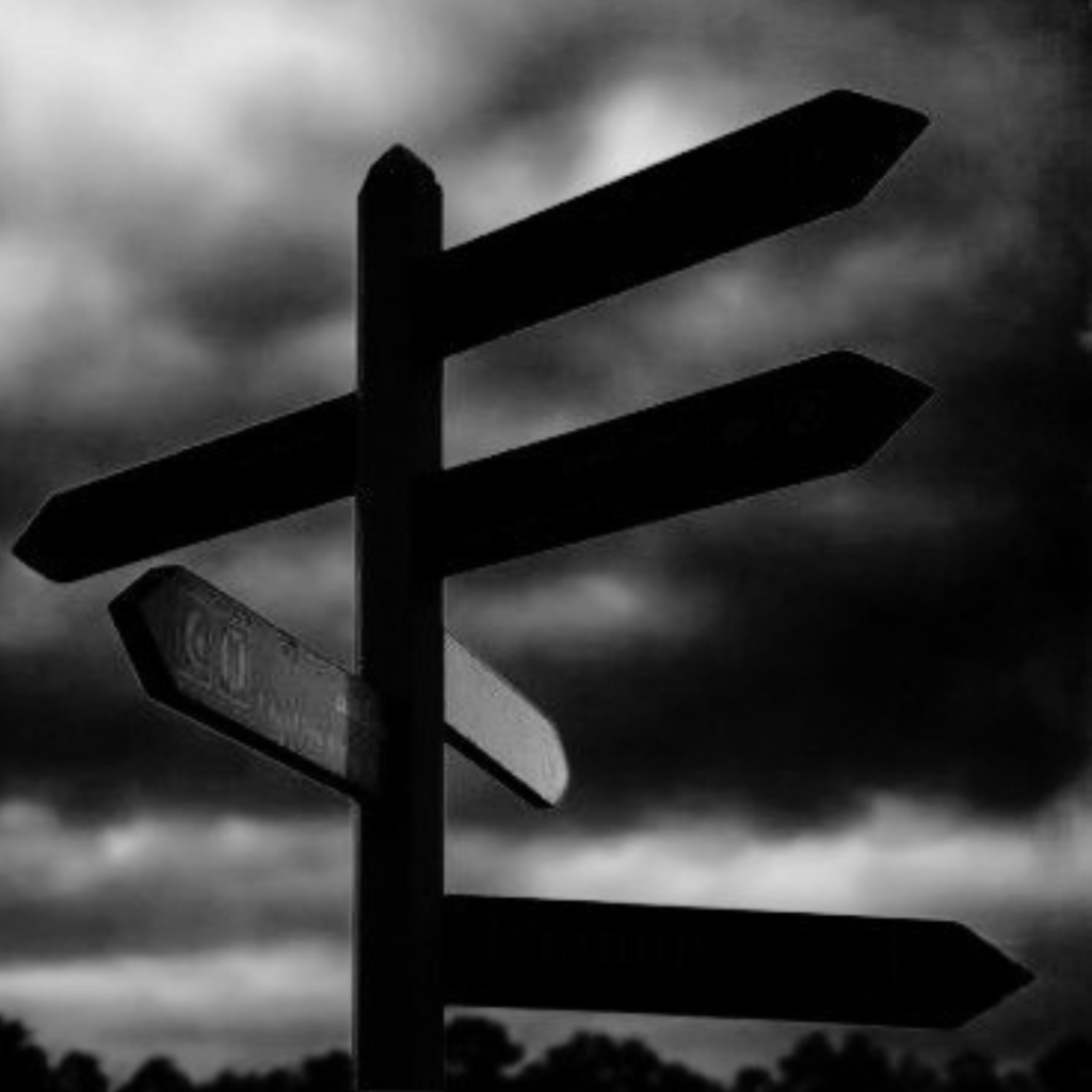 A multi-directional signpost against a stormy sky, illustrating the choice of lending route and licensed versus illegal lenders.